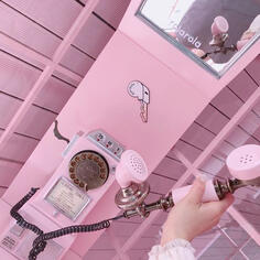 a pink payphone